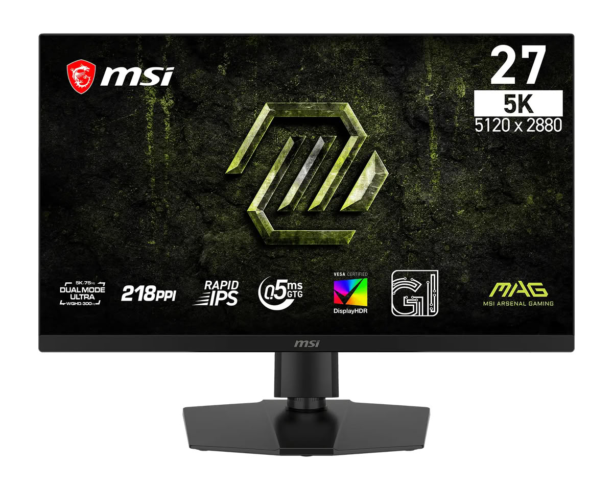 Monitor de computador preto sobre suporte de mesa poligonal, visto de frente. Na tela escura há uma ilustração em relevo metálico com o escudo geométrico da MSI ao centro, logotipo vermelho da marca no canto superior esquerdo e a inscrição '27 5K 5120 x 2880' no canto superior direito. Na borda inferior da imagem aparecem ícones brancos indicando Dual Mode Ultra, 218 PPI, Rapid IPS, 0.5ms GTG, DisplayHDR e o logotipo da linha MAG